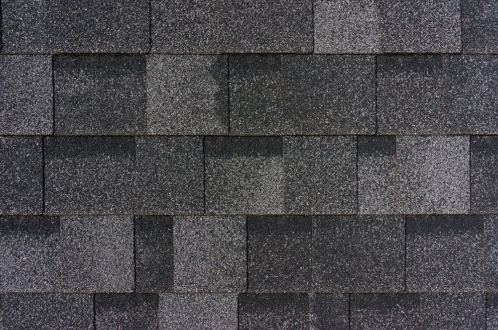 Dark grey roof tiles. Grey shingles.